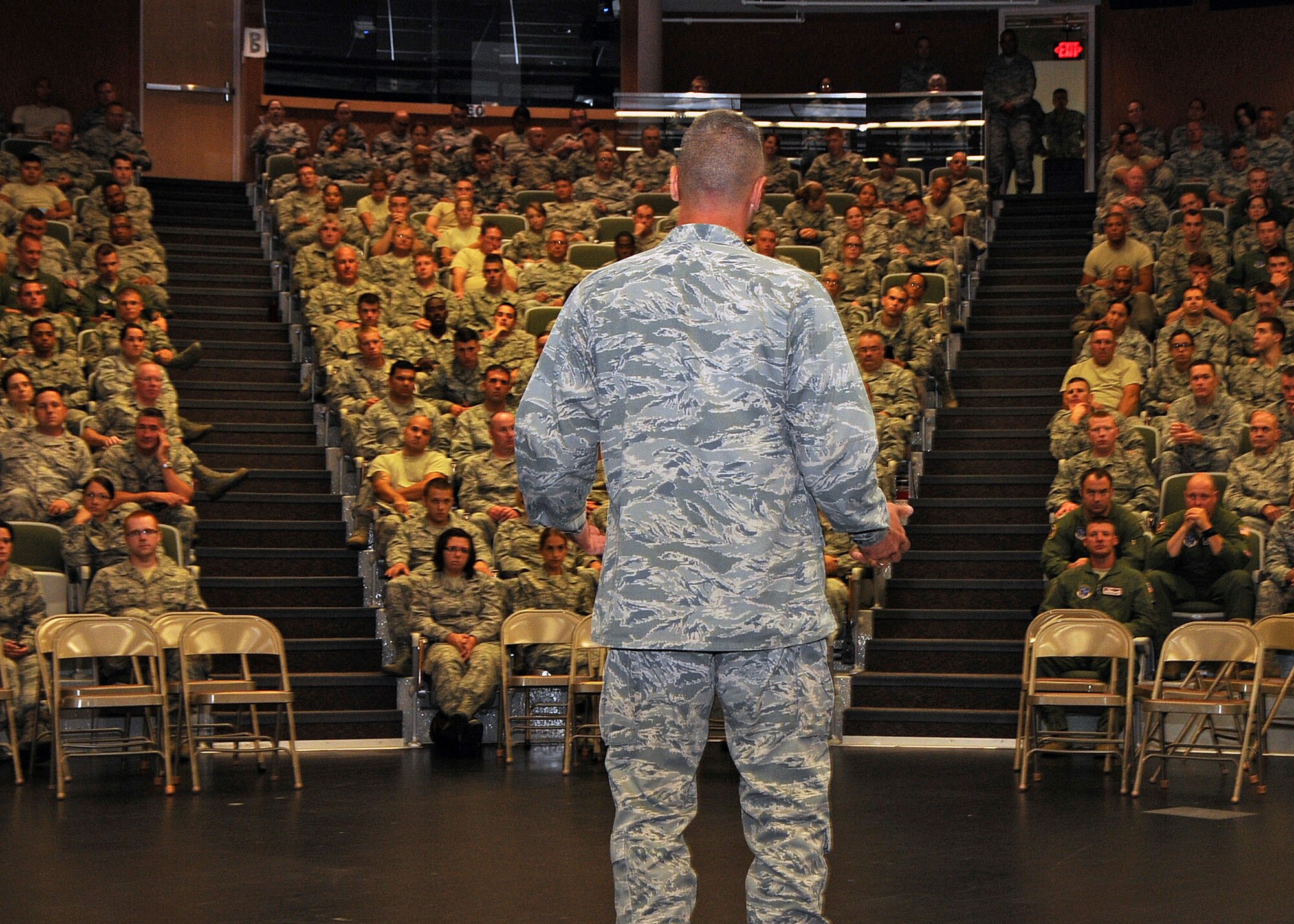 Colonel Arthur Floru, 143d Airlift Wing Commander, addresses the members of the 143d AW during the Rhode Island Air National Guard's annual Wingman Day on 3 August 2014. The event was held at the Knight Campus of the Community College of Rhode Island in Warwick, RI. National Guard Photo by Technical Sgt Jason Long (RELEASED)