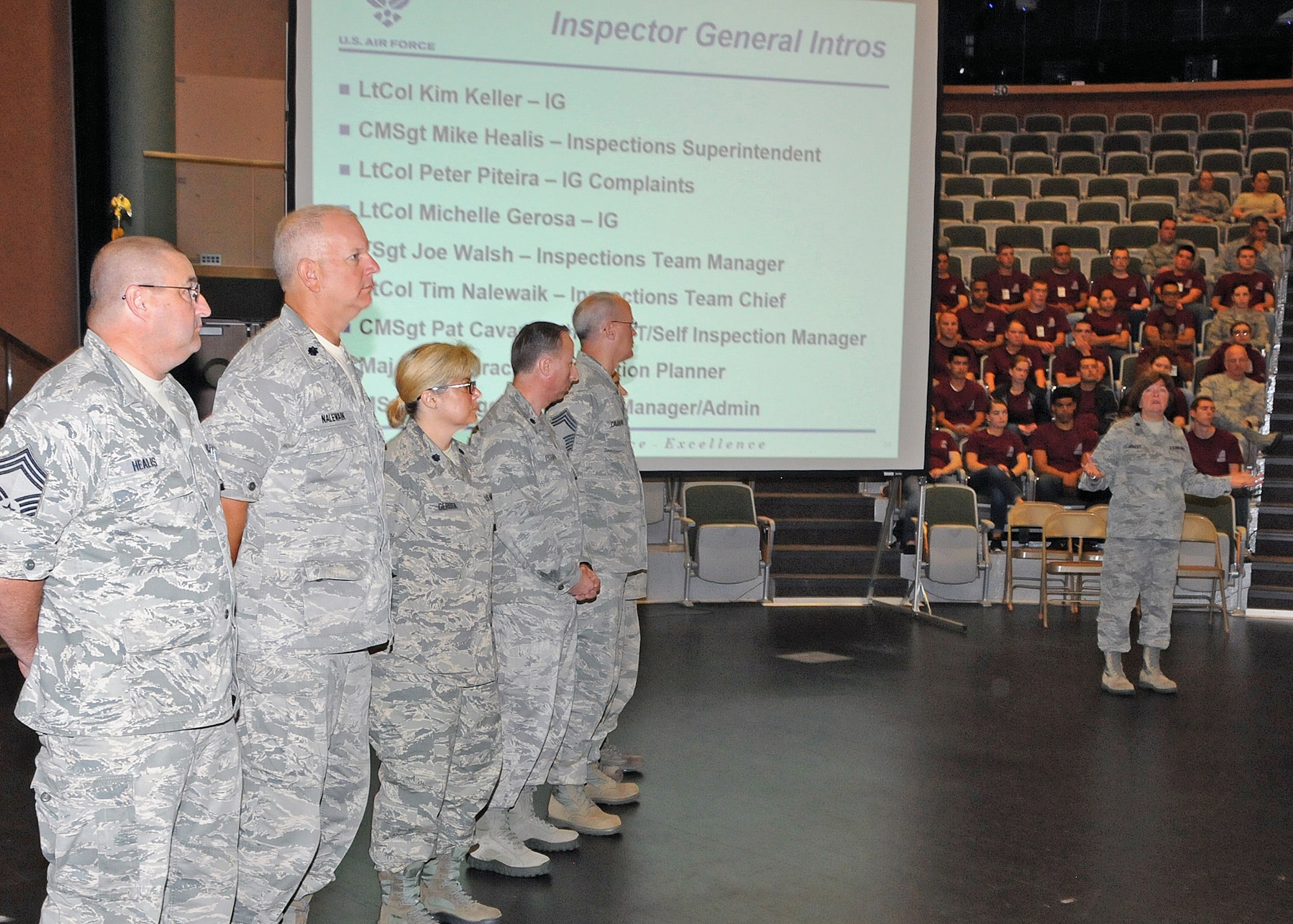 Lieutenant Colonel Kimberly Keller, 143d Mission Support Group Deputy Commander and Wing Inspector General Team Lead, introduces the members of the 143d AW Inspector General Team during the Rhode Island Air National Guard's annual Wingman Day on 3 August 2014. The event was held at the Knight Campus of the Community College of Rhode Island in Warwick, RI. National Guard Photo by Technical Sgt Jason Long (RELEASED)