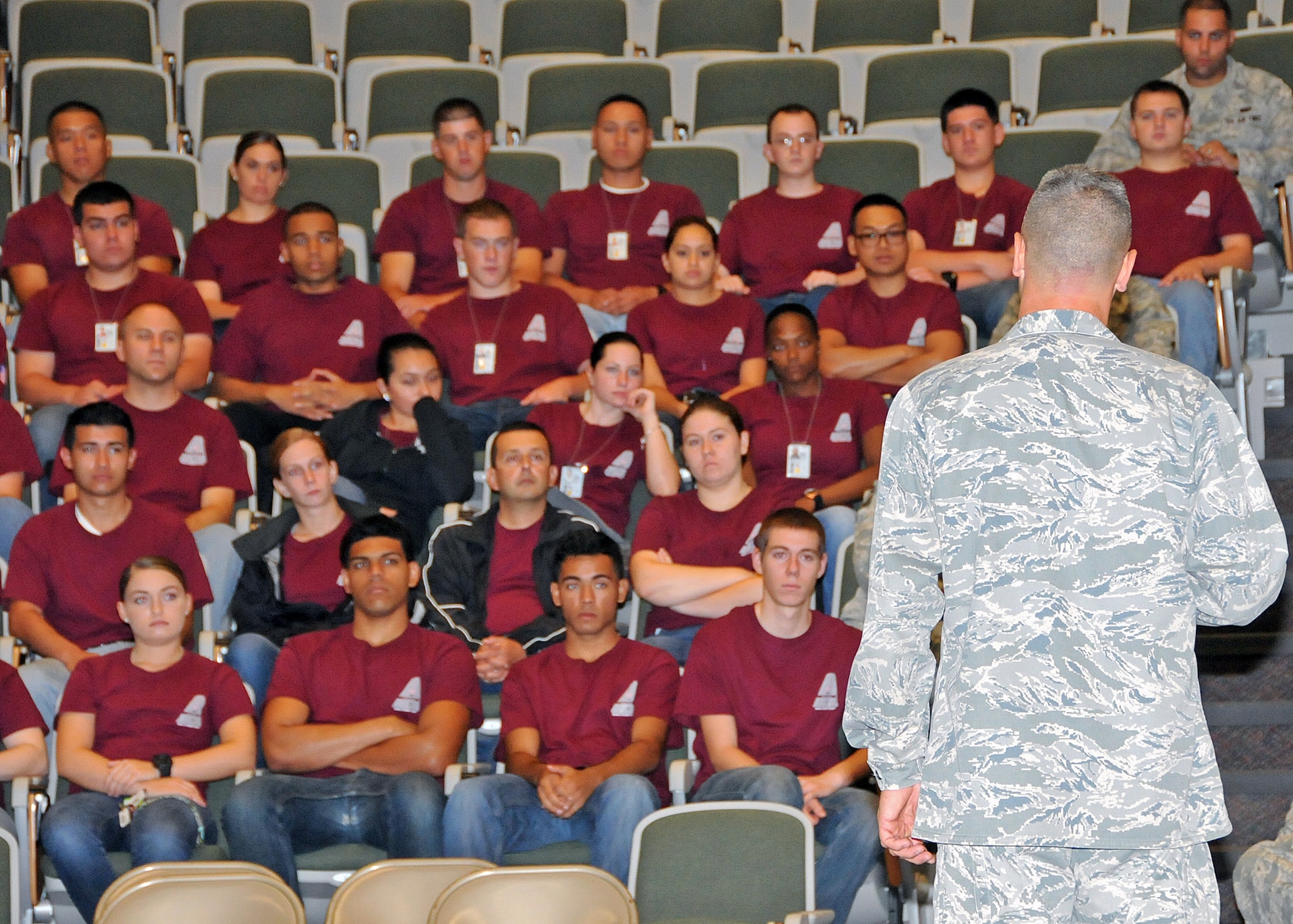 Colonel Arthur Floru, 143d Airlift Wing Commander, turns to address the members of the 143d AW Student Flight during the Rhode Island Air National Guard's annual Wingman Day on 3 August 2014. The event was held at the Knight Campus of the Community College of Rhode Island in Warwick, RI. National Guard Photo by Technical Sgt Jason Long (RELEASED)
