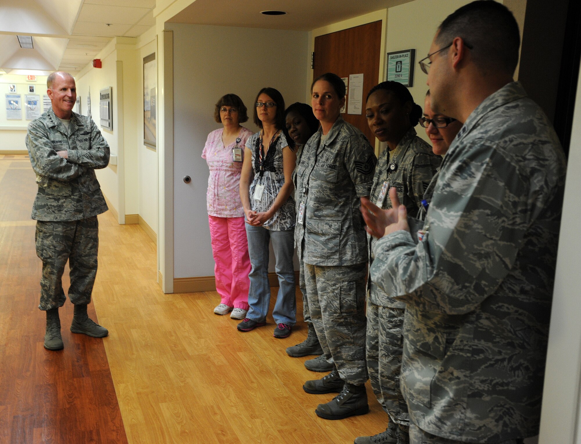 Lt. Gen. Stephen Wilson, Air Force Global Strike Command commander, speaks with the 341st Medical Support Squadron pharmacy staff at the Malmstrom Air Force Base clinic Aug. 4. Focused on current Force Improvement Program initiative updates and to share his top priorities for the future of AFGSC, Wilson’s comprehensive visit included meetings with wing leadership as well as a missile alert facility, Weapon’s Storage Area and 341st Medical Group tour.  (U.S. Air Force photo/Airman 1st Class Joshua Smoot)