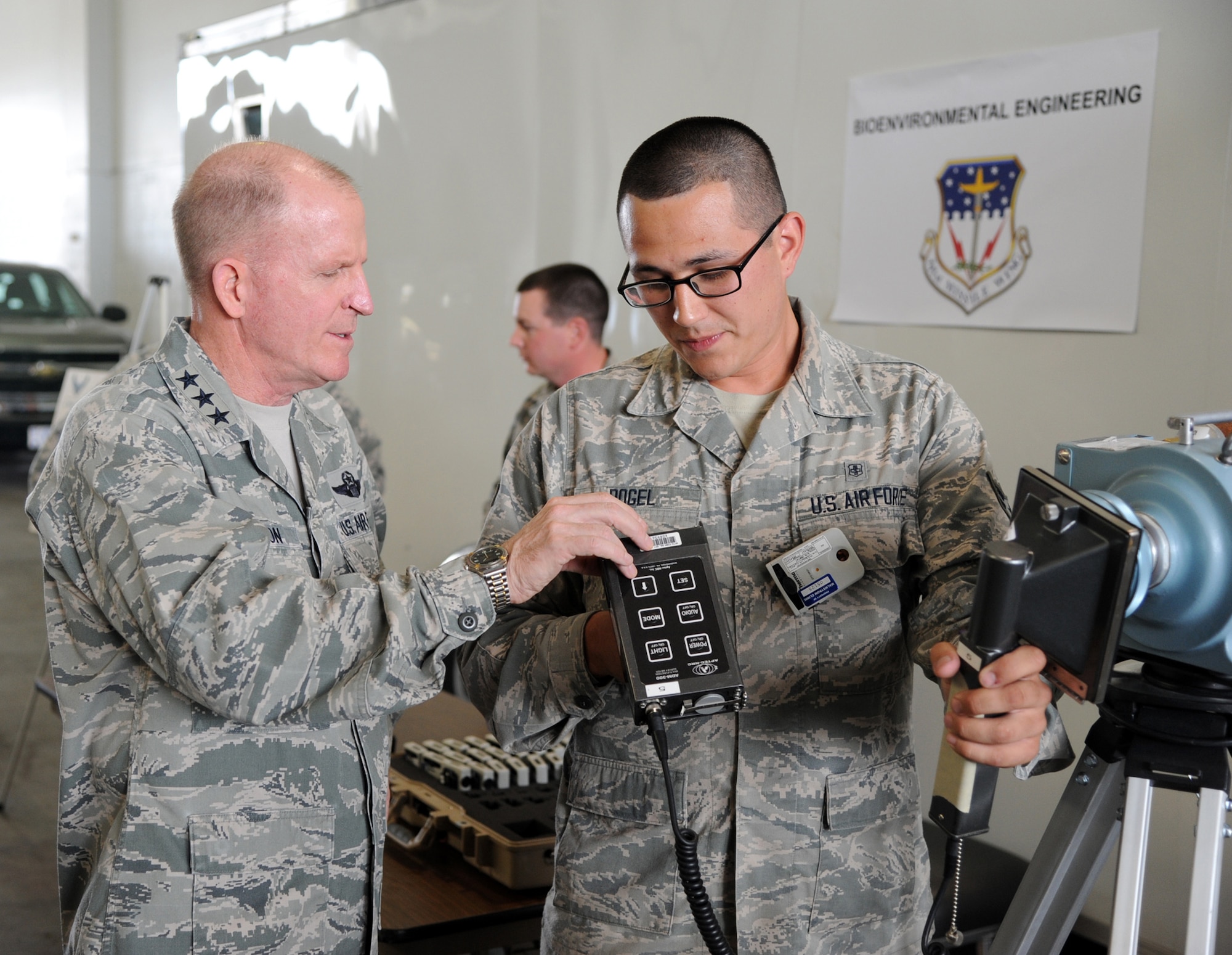 Airman 1st Class Joel Rogel, 341st Medical Operations Squadron bioenvironmental engineering technician, shows Lt. Gen. Stephen Wilson, Air Force Global Strike Command commander, a few tools bioenvironmental technicians use during an emergency response expo Aug. 4. As part of Wilson’s tour of the expo, he visited with Malmstrom’s field response team, bioenvironmental engineering team, emergency management, explosive ordinance disposal, fire and emergency services, law enforcement, tactical response force and other first responders. (U.S. Air Force photo/Airman 1st Class Joshua Smoot)