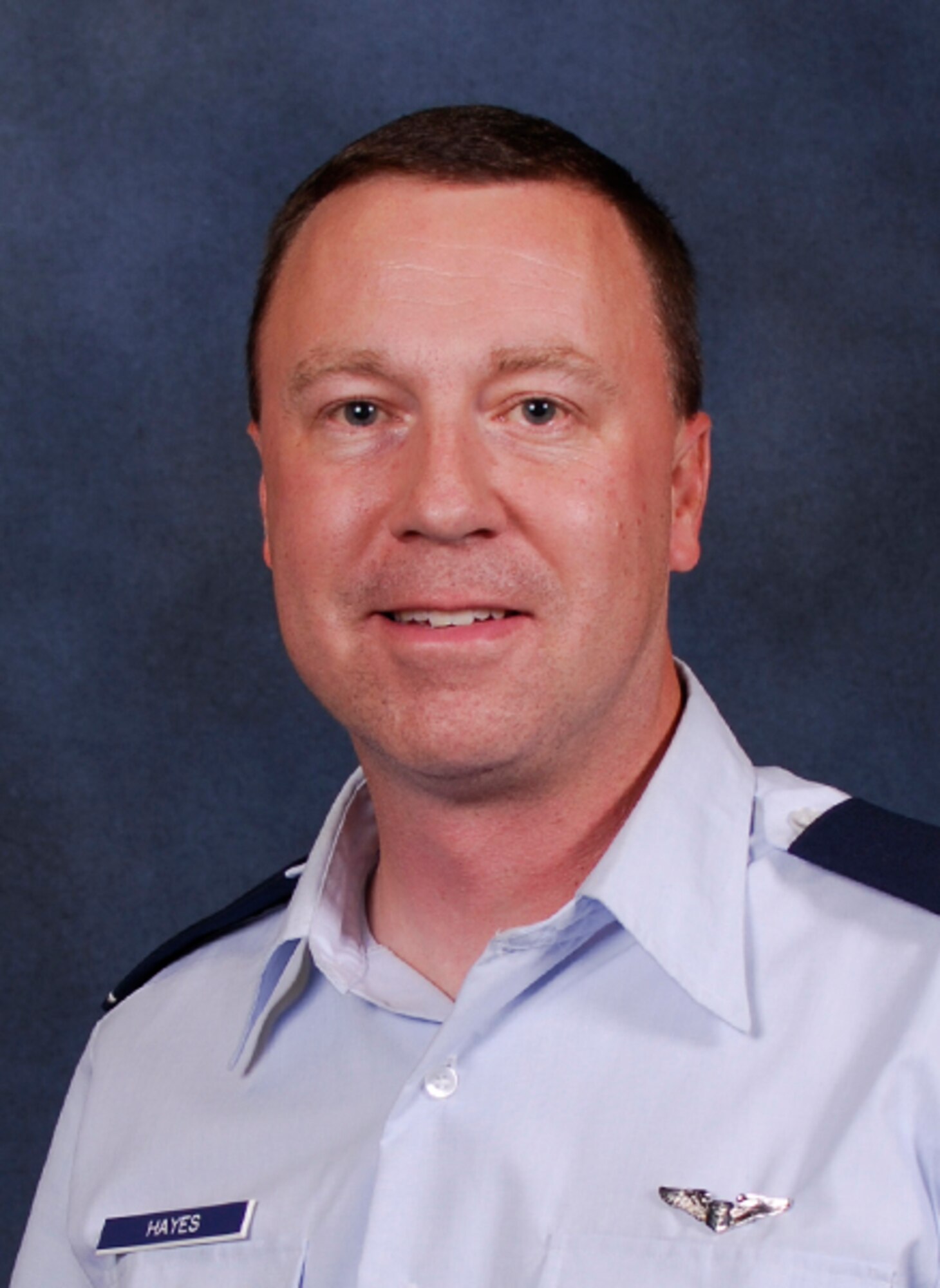 Lt. Col. Justin Hayes was one of three 188th Medical Group members who saved the life of a choking baby June 7, 2014, at a ceremony being held in the 188th Wing’s main hangar at Ebbing Air National Guard Base, Fort Smith, Arkansas. (U.S. Air National Guard photo by 188th Wing Public Affairs)