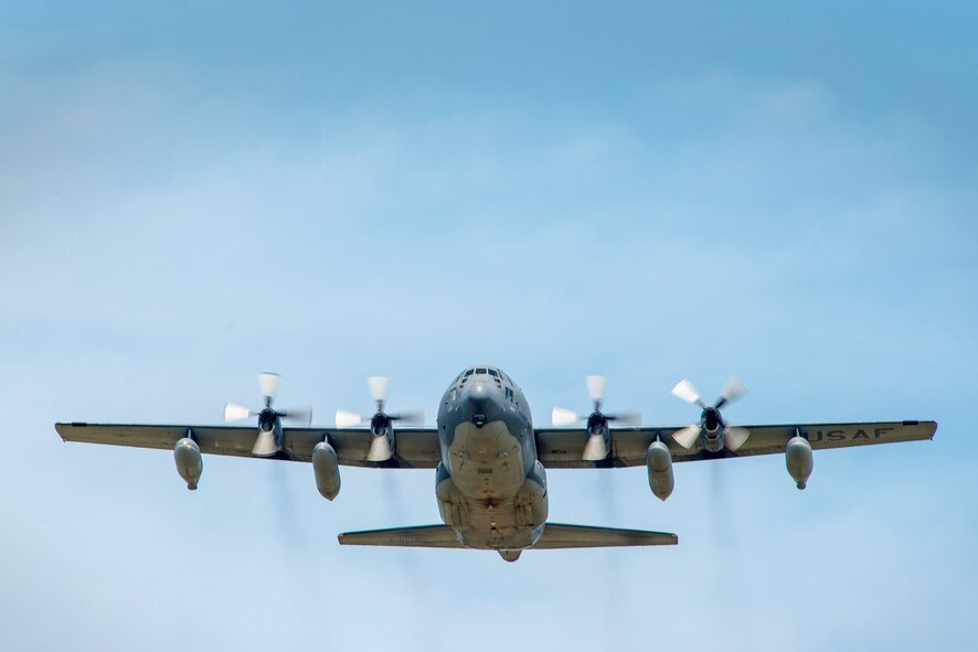 An HC-130P Combat King assigned to the 71st Rescue Squadron flies overhead at Moody Air Force Base, Ga., Aug. 5, 2014. The aircraft and the Airmen onboard returned to Moody after a five-month deployment in support of Air Forces Africa, completing the final deployment for active-duty HC-130Ps. (U.S. Air Force photo by Airman 1st Class Ryan Callaghan/Released)