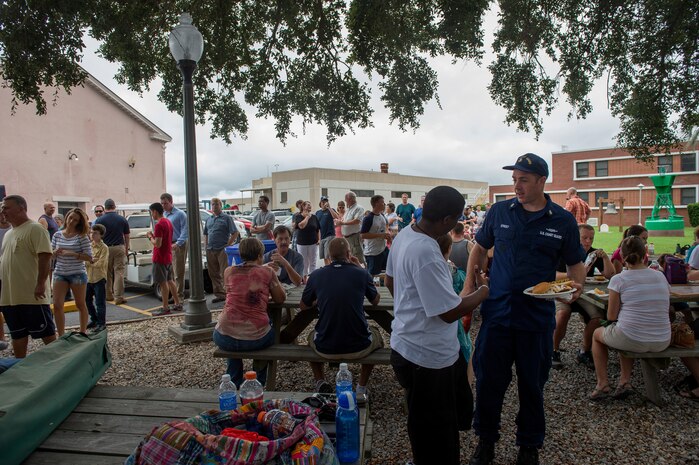 Active-duty Coast Guard, reservists and their families, celebrate the 224th birthday of the service Aug. 4, 2014, at U.S.C.G. Sector Charleston, S.C. The celebration had a cook-out, games and raffle prizes. (U.S. Air Force photo/Senior Airman George Goslin)