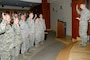 Lt. Col. Jonathan Boyd, vice wing commander of the 151st Air Refueling Wing, administers the Inspector General Oath of Office to more than 30 Airmen who will become the newest members of the Wing Inspection Team. The team is comprised of a total of 91 Airmen from across the base whose goal is to help ensure unit readiness by performing inspections and evaluations for the new Commander’s Inspection Program. The Utah Air National Guard is expected to undergo a Unit Effectiveness Inspection under the program in July 2015. (Utah Air National Guard photo by Staff Sgt. Joe Davis/RELEASED)