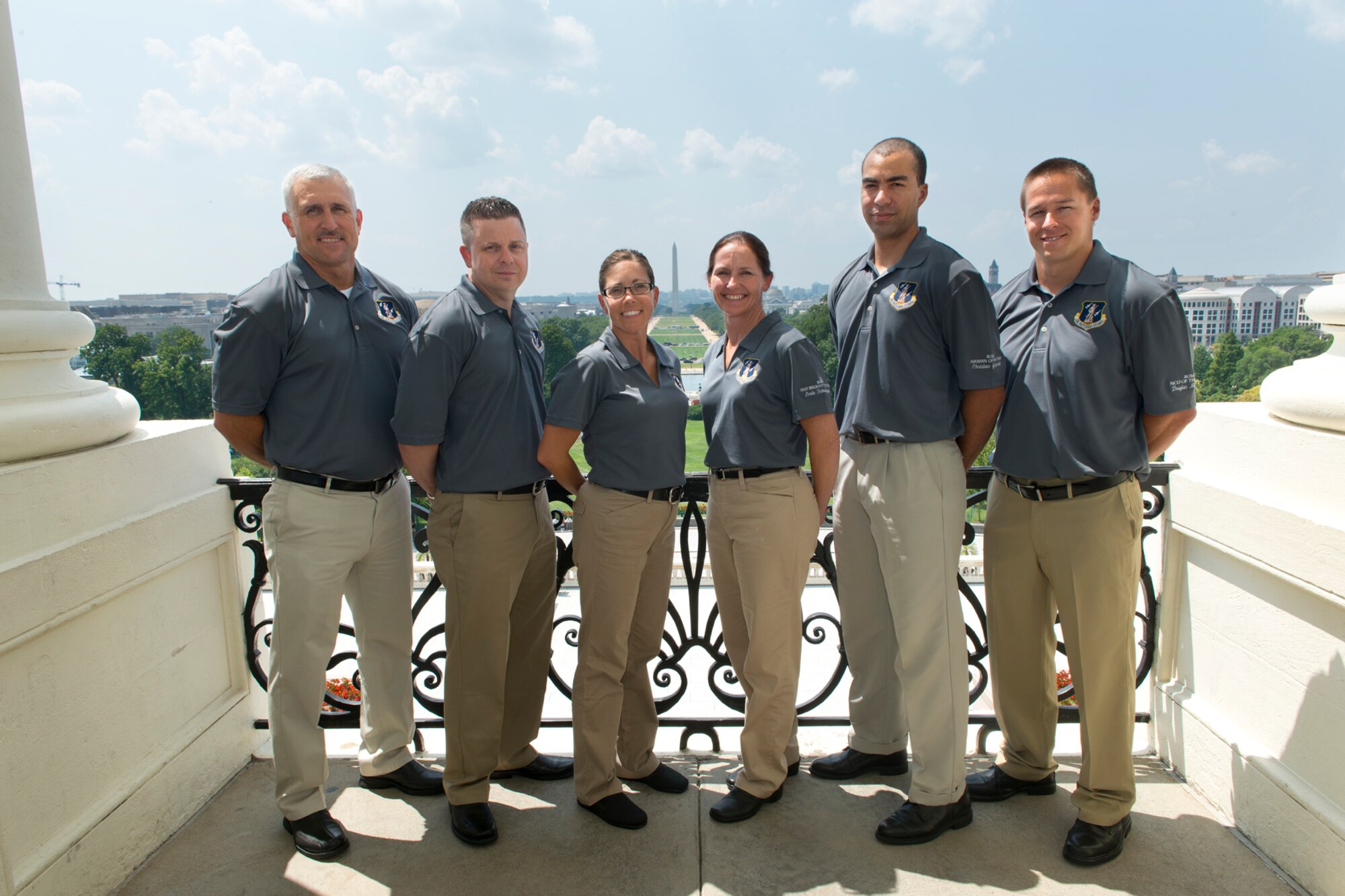 The ANG Outstanding Airmen of the Year pose for a photograph at the U.S. Capitol, Washington, D.C., August 5, 2014. The OAY are: (left to right) Master Sgt. David Coker, Honor Guard Program Manager of the Year, Master Sgt. Joseph G. Ashwood, Senior Non-Commissioned Officer of the Year, Tech. Sgt. Amy Ough, Honor Guard Member of the Year, Master Sgt. Linda Schwartzlow, First Sgt. of the Year, Senior Airman Christian Goldsmith, Airman of the Year, and Tech. Sgt. Doug Matthews, Non-Commissioned Officer of the Year. (Air National Guard photo by Master. Sgt. Marvin R. Preston/Released)