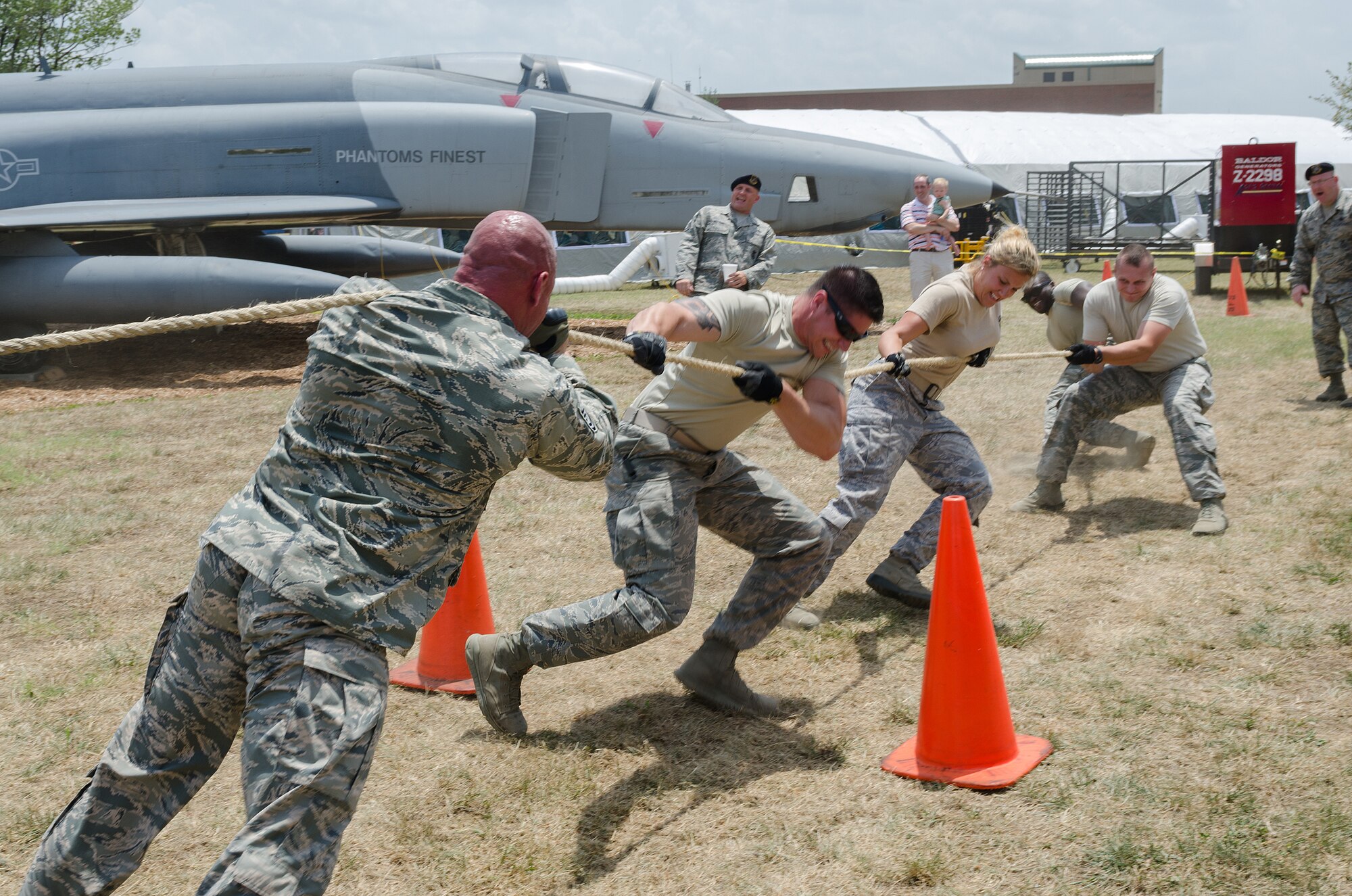 More than 500 family members and retirees attended The 123rd Airlift Wing’s annual Family Day at the Kentucky Air National Guard Base in Louisville, Ky., on July 13, 2014. This year’s event was the largest ever hosted by the wing and featured such activities as a tug-of-war tournament, petting zoo and pony rides. (U.S. Air National Guard photo by Senior Airman Joshua Horton)
