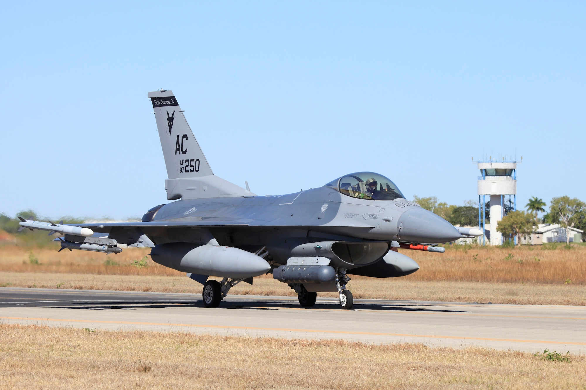 Pitch Black 2014 gets under way as an F-16 Fighting Falcon aircraft from the New Jersey Air National Guard taxis out at Royal Australian Air Force Base Tindal, Australia. The ANG unit is deployed to Australia from Kunsan Air Base, Republic of Korea. Pitch Black is the RAAF’s largest and most complex air exercise, traditionally held in the Northern Territory every two years. Exercise Pitch Black is being conducted from RAAF Bases Darwin and Tindal Aug. 1 through 22, 2014, featuring participants from Australia, the United States, New Zealand, Singapore, Thailand, United Arab Emirates and French Air Force (New Caledonia) who will cooperate for Offensive Counter Air (OCA) and Defensive Counter Air (DCA) missions. (Royal Australian Air Force photo by Cpl. David Gibbs/Released) 