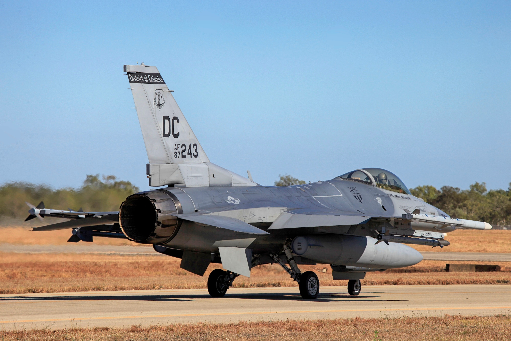 Pitch Black 2014 gets under way as an F-16 Fighting Falcon aircraft from the D.C. Air National Guard taxis out at Royal Australian Air Force Base Tindal, Australia. The ANG unit is deployed to Australia from Kunsan Air Base, Republic of Korea. Pitch Black is the RAAF’s largest and most complex air exercise, traditionally held in the Northern Territory every two years. Exercise Pitch Black is being conducted from RAAF Bases Darwin and Tindal Aug. 1 through 22, 2014, featuring participants from Australia, the United States, New Zealand, Singapore, Thailand, United Arab Emirates and French Air Force (New Caledonia) who will cooperate for Offensive Counter Air (OCA) and Defensive Counter Air (DCA) missions. (Royal Australian Air Force photo by Cpl. David Gibbs/Released)  