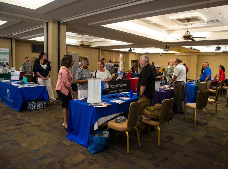 Moody Airmen and guests attend the annual Education Fair at Moody Air Force Base, Ga., Aug. 6, 2014.  The fair hosted 22 different schools that offered traditional and online programs from associate to doctorate degrees. (U.S. Air Force photo by Airman 1st Class Ceaira Tinsley/Released)