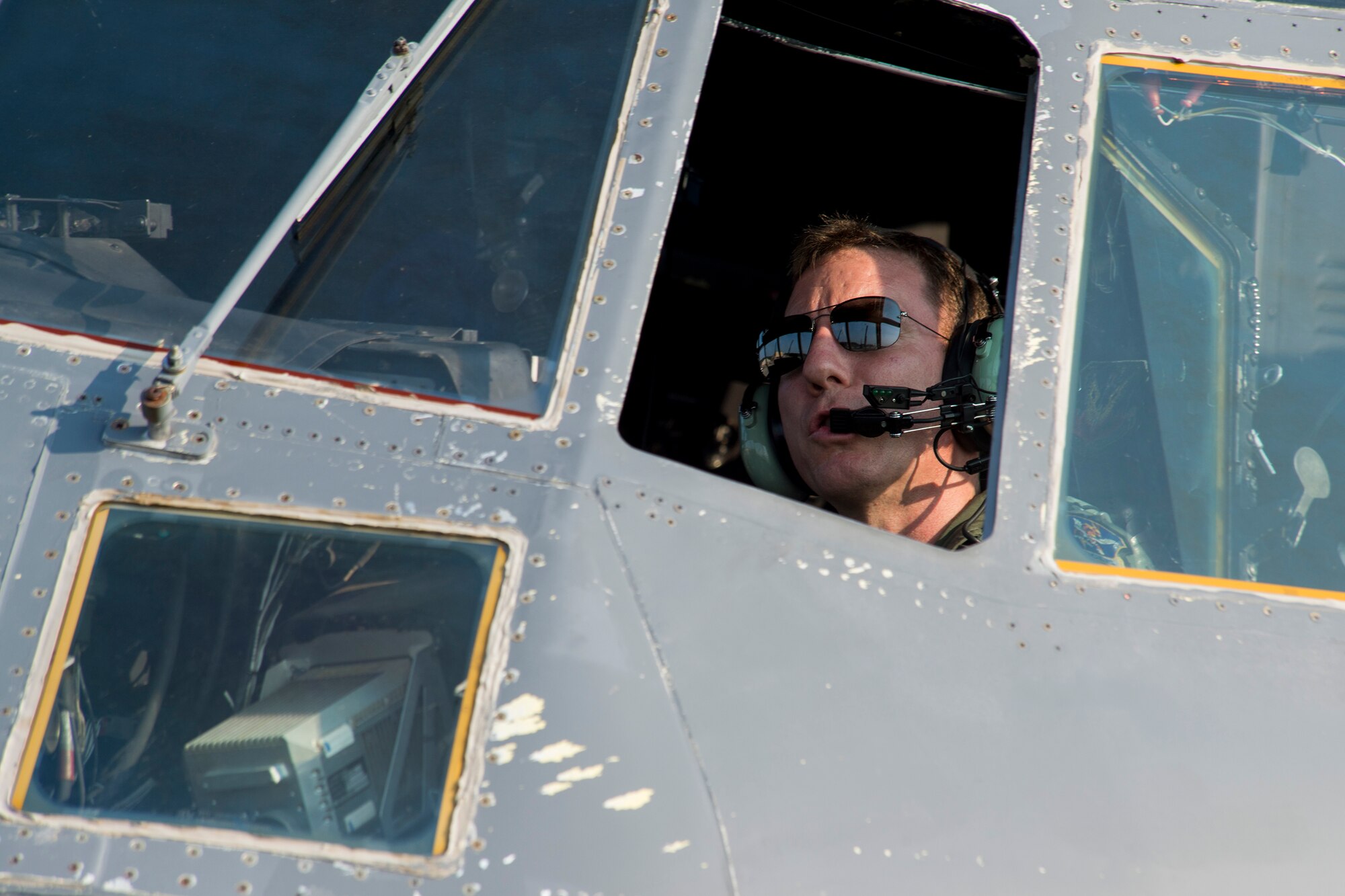 U.S. Air Force Lt. Col. David Casson, HC-130 pilot, prepares HC-130P Combat King, tail number 64-4863, for flight to Davis-Monthan Air Force Base, Ariz., Aug. 6, 2014, at Moody Air Force Base, Ga. In addition to staying current on his pilot-training requirements, Casson serves as the 23d Wing chief of safety. (U.S. Air Force photo by Staff Sgt. Jamal D. Sutter/Released) 