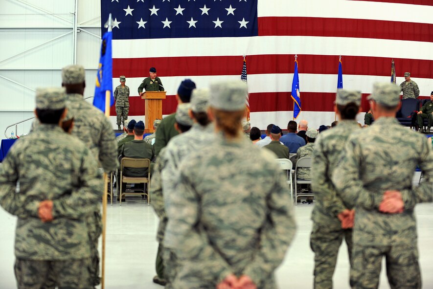 Col. Ross Anderson, 926th Group commander, speaks during the 926th GP’s change of command ceremony at Nellis Air Force Base, Nev., July 31, 2014. Through Total Force Integration, the 926th GP provides combat-ready reservists to the U.S. Air Force Warfare Center as sustained expertise at the operational and tactical levels of warfare. It continuously conducts combat operations, operational test and evaluation, tactics development and advanced training to forge the tools required to fly, fight and win. (U.S. Air Force photo by Airman 1st Class Mikaley Towle) 
