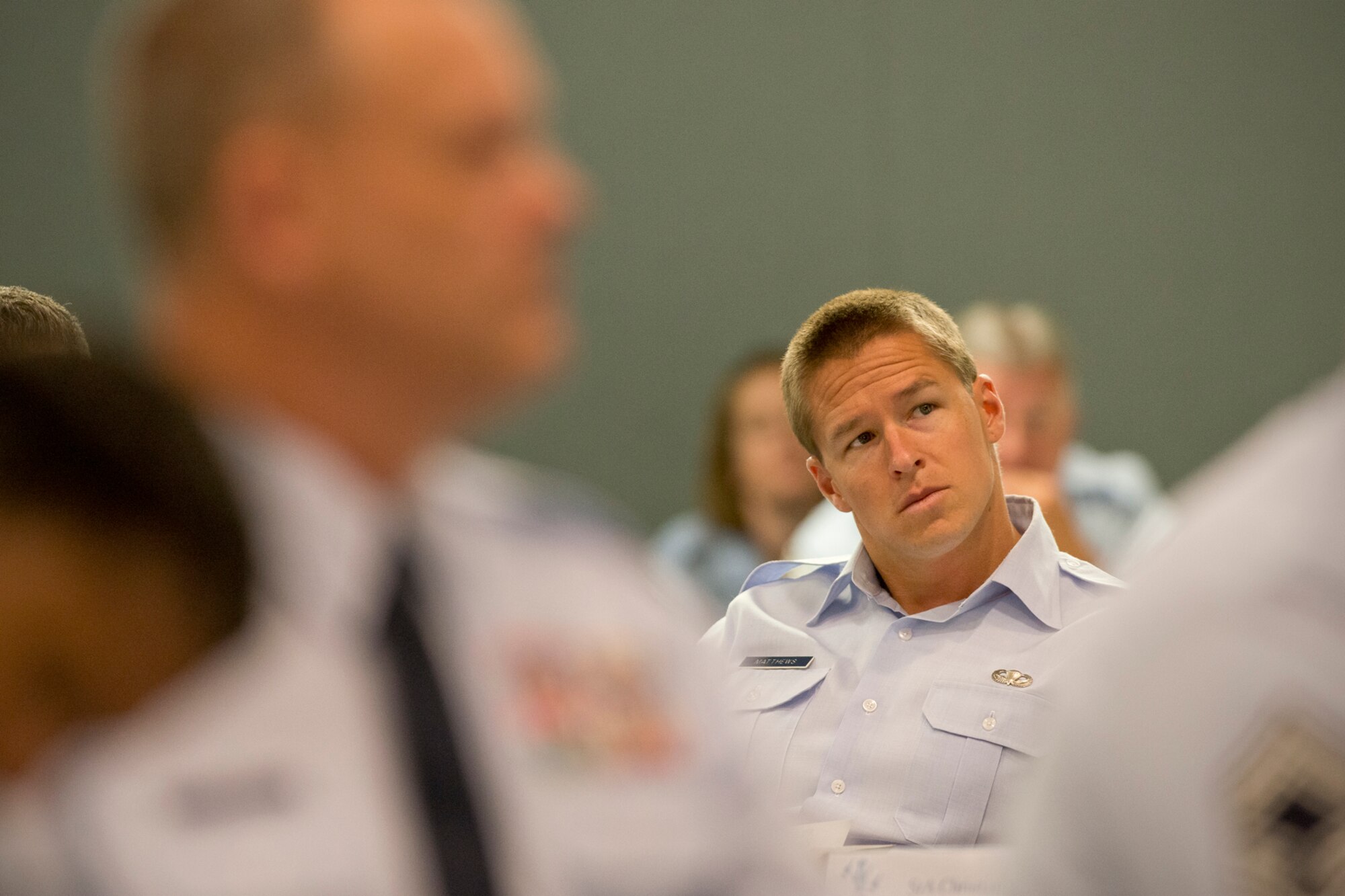 Tech. Sgt. Douglas Matthews, a combat controller assigned to the 125th Special Tactics Squadron, Oregon Air National Guard, listens to a briefing by Chief Master Sgt. James W. Hotaling, the command chief of the ANG, as he addresses the Chief's Executive Course at Joint Base Andrews, Md. Aug. 4, 2014. Matthews, who was recently awarded the Silver Star, the nation's third-highest award for valor, is the ANG Outstanding Non Commissioned Officer of the Year. The CEC provides recently-promoted chief master sergeants with a broad view of total force operations at a strategic level. (Air National Guard photo by Master Sgt. Marvin R. Preston/Released)