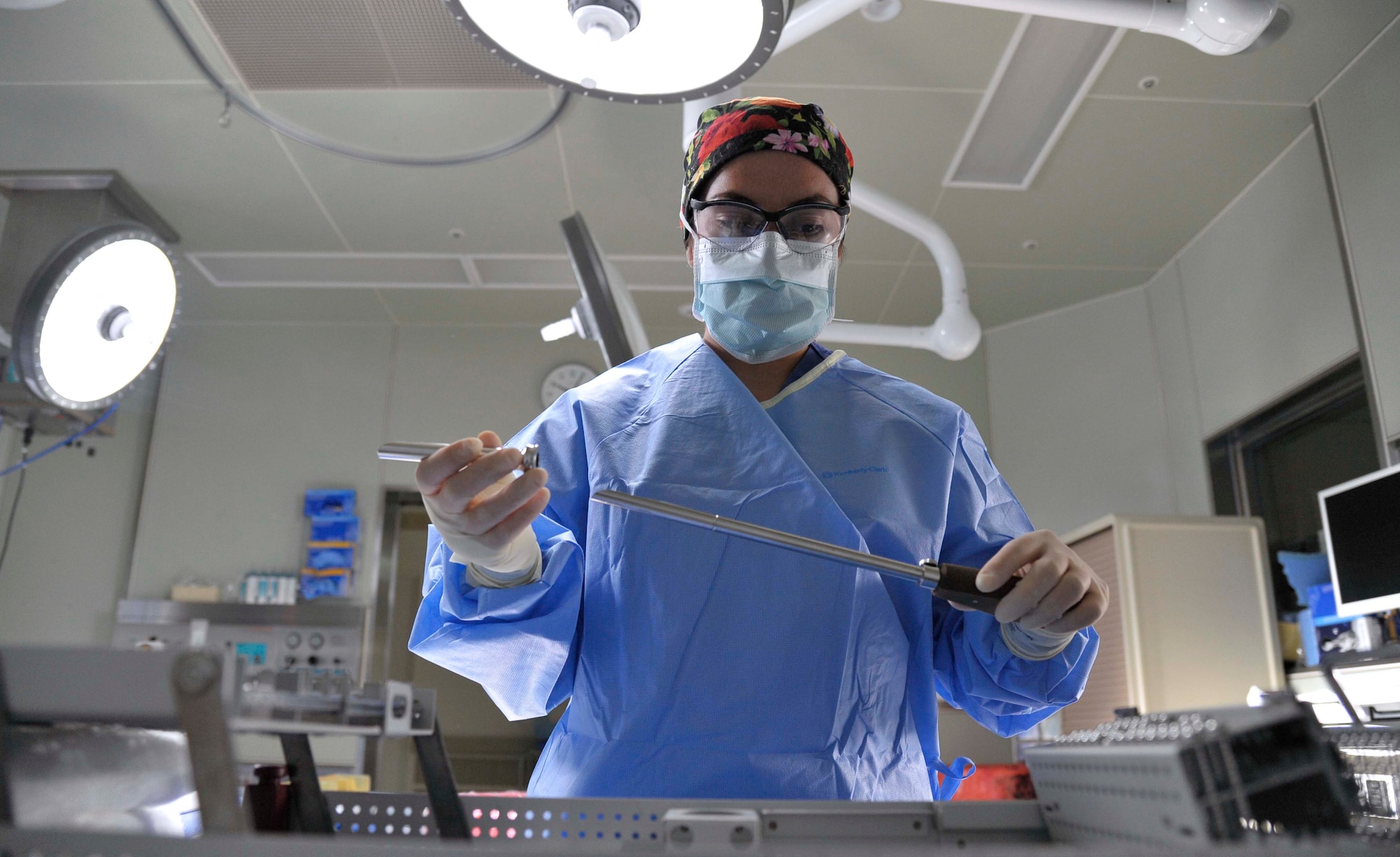 U.S. Air Force Staff Sgt. Maria Arriola, 35th Surgical Operations Squadron surgical technician, prepares a set of tools for an operation at Misawa Air Base, Japan, Aug. 4, 2014. While in the operating room, Arriola maintains patient safety by ensuring surgical instruments are sterilized and arranged properly. (U.S. Air Force photo/Airman 1st Class Patrick S. Ciccarone)