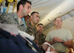 Expeditionary Medical Support System (EMEDS) personnel from the Kansas Air National Guard demonstrate Emergency Room procedures to the Armenian delegation during Vigilant Guard 2014, Salina, Kansas, Aug. 5, 2014. The delegation's visit is through the National Guard's State Partnership Program. The Kansas National Guard has been partnered with Armenia since 2003.