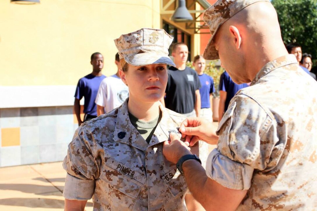 Staff Sgt. Julianna Pinder earned a meritorious promotion to her current rank, July 2, 2014. Pinder, a Novato, Calif. native, competed with over 105 Marines in Western Recruiting Region to earn her promotion. Pinder is a single mother, and is currently a canvassing recruiter at United States Marines, RSS Antioch.
