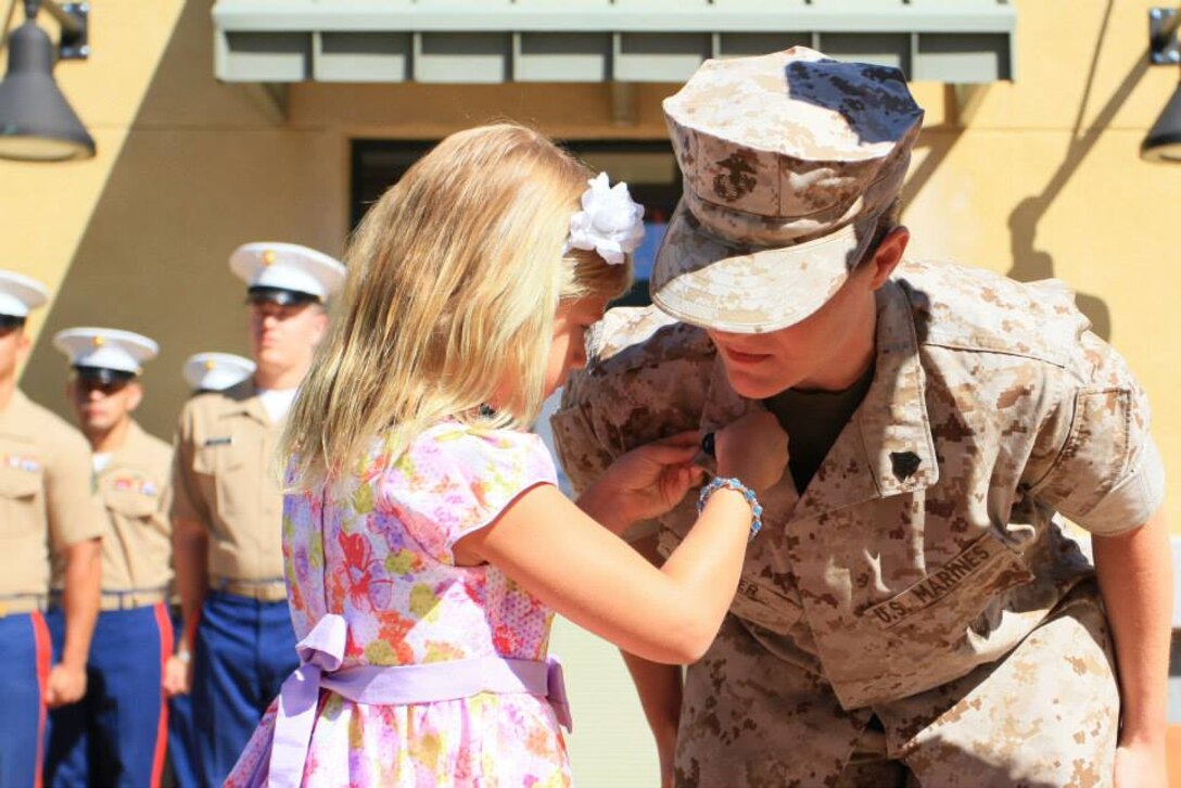 Staff Sgt. Julianna Pinder earned a meritorious promotion to her current rank, July 2, 2014. Pinder, a Novato, Calif. native, competed with over 105 Marines in Western Recruiting Region to earn her promotion. Pinder is a single mother, and is currently a canvassing recruiter at United States Marines, RSS Antioch.