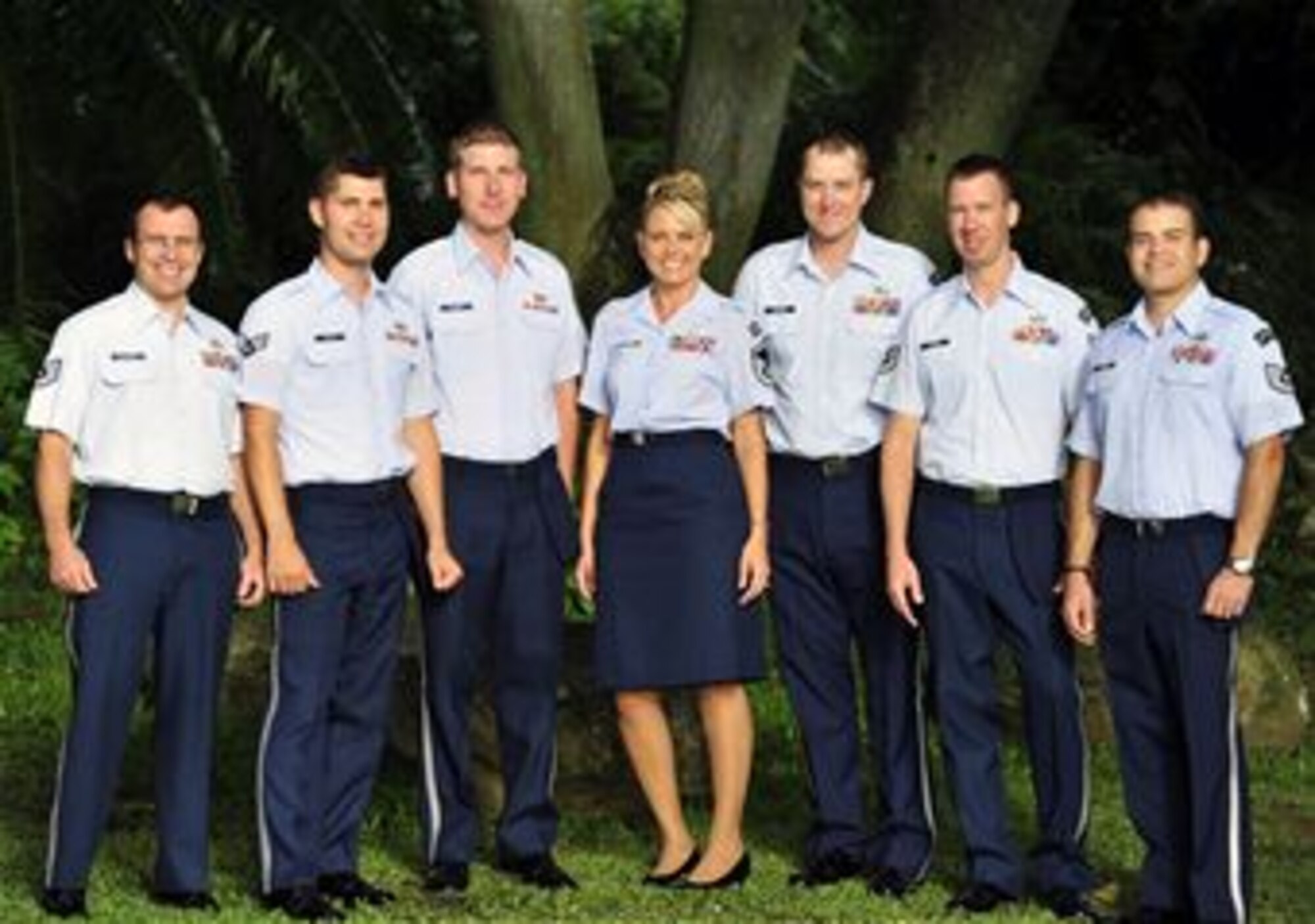 Honolulu, Hawaii – Papana, from the Band of the Pacific-Hawaii, poses for a group shot before they play at the Foster Botanical Gardens, during the Twilight Concert Series. The Twilight Concert series allows community members to browse exotic plants and listen to talented musical groups, such as Papana, at not cost! (US Air Force Photo/ SSgt Courtney Clifford /released)