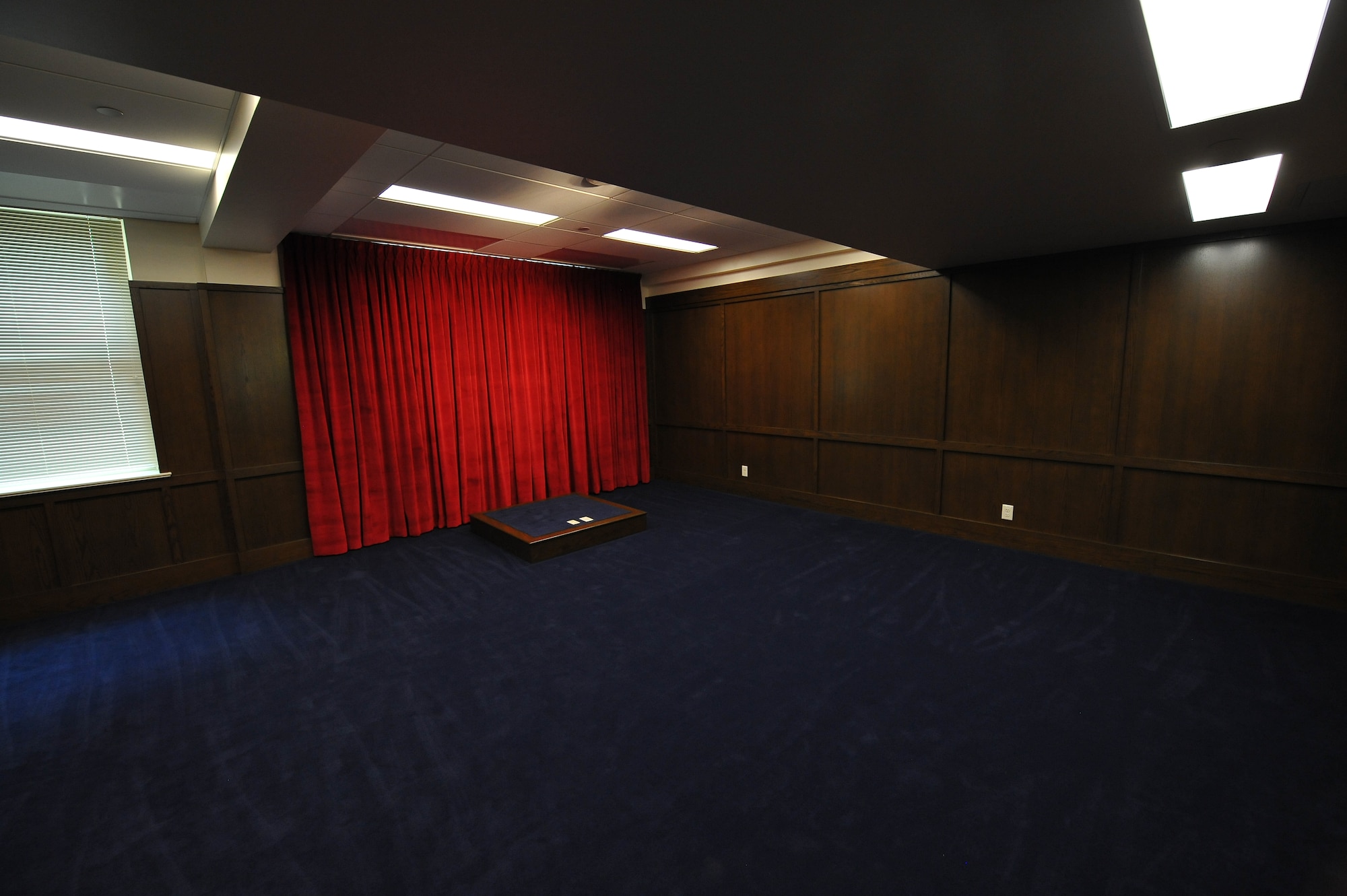 A ceremonial room where service members recite the Oath of Enlistment lies empty during the transition to the newly renovated Military Entrance Processing Station Aug. 1, 2014, at the Denver Federal Center in Denver, Colo. The transition will enhance the staff's ability to provide efficient  service to more than 200 applicants a day. (U.S. Air Force photo by Senior Airman Phillip Houk/Released)