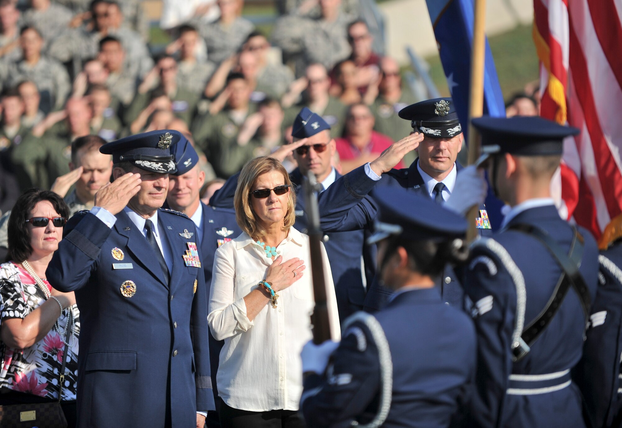 ALTUS AIR FORCE BASE, Okla. – Members of the 97th Air Mobility Wing Honor Guard present the colors during a KC-46 groundbreaking ceremony Aug. 7, 2014. The ceremony represented the beginning of construction for a flight training center, a fuselage training facility, new aircraft hangars and renovations for a combined squadron operations and aircraft maintenance unit facility. (U.S. Air Force photo by Senior Airman Dillon Davis/Released) 