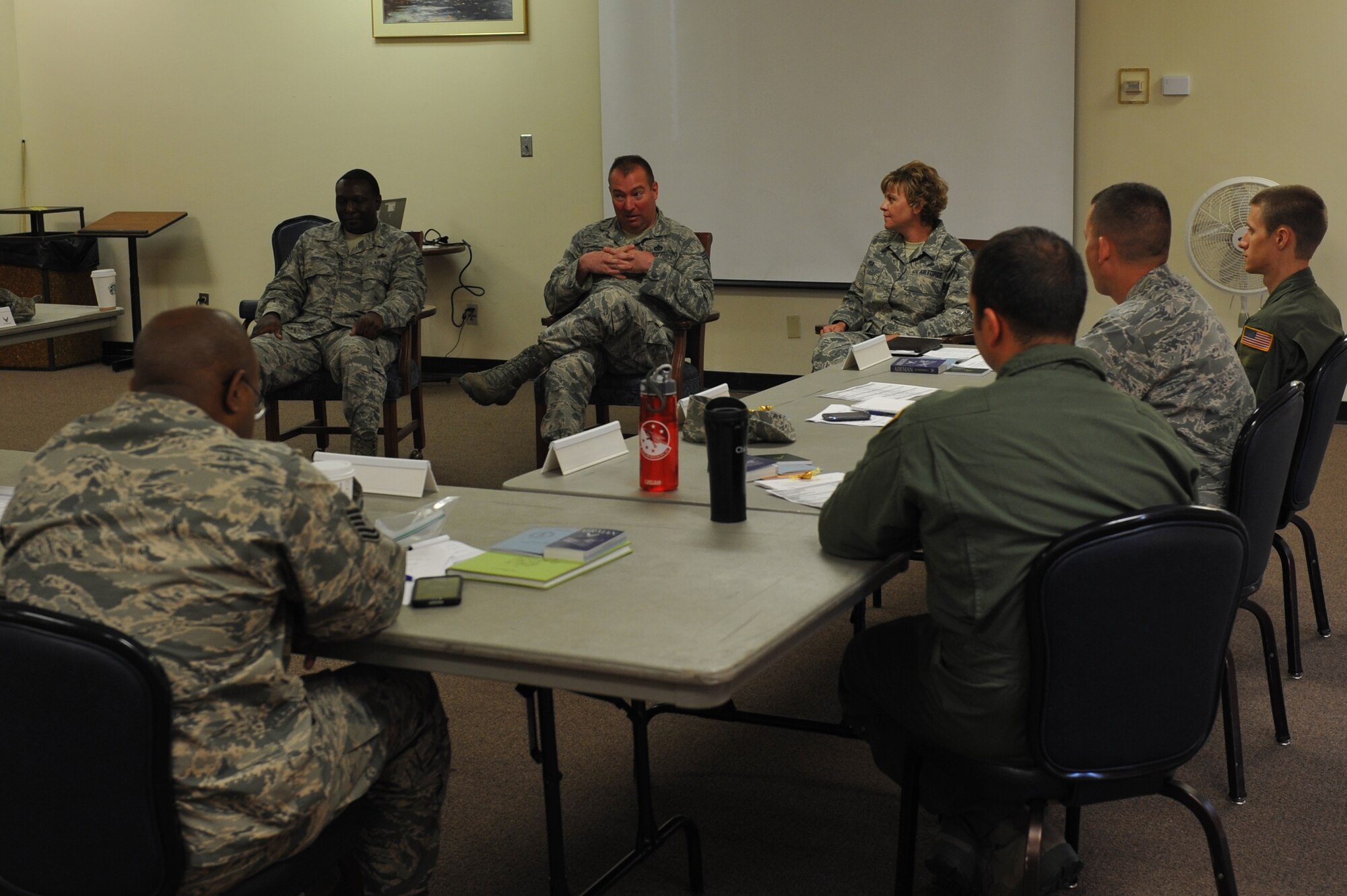 ALTUS AIR FORCE BASE, Okla. – U.S. Air Force Chief Master Sgts. Freddie Dorsey, , Lonnie Bacon, and Shannon Rix, hold a discussion with the senior NCO-selects during the Altus senior NCO Professional Enhancement seminar in the Freedom Community Center Aug. 6, 2014. During the discussion, the chiefs discussed added responsibility, encouragement and mentorship. (U.S. Air Force photo by Airman 1st Class J. Zuriel Lee/Released)