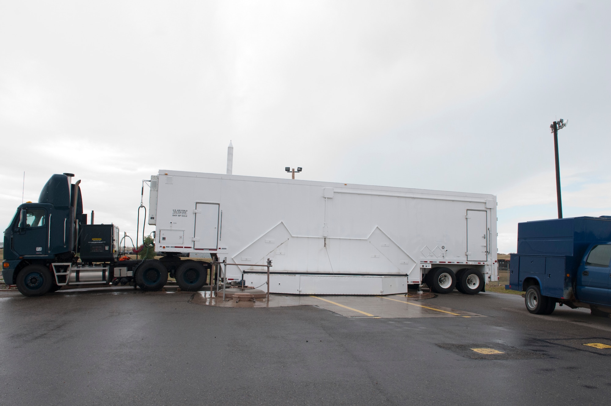 A payload transporter sits on the U-01 practice launch facility on F.E. Warren Air Force Base, Aug. 4, 2014. The primary role of the practice launch facility is to prepare Airmen in the maintenance of the Minuteman III weapons system. (U.S. Air Force photo by Lan Kim)