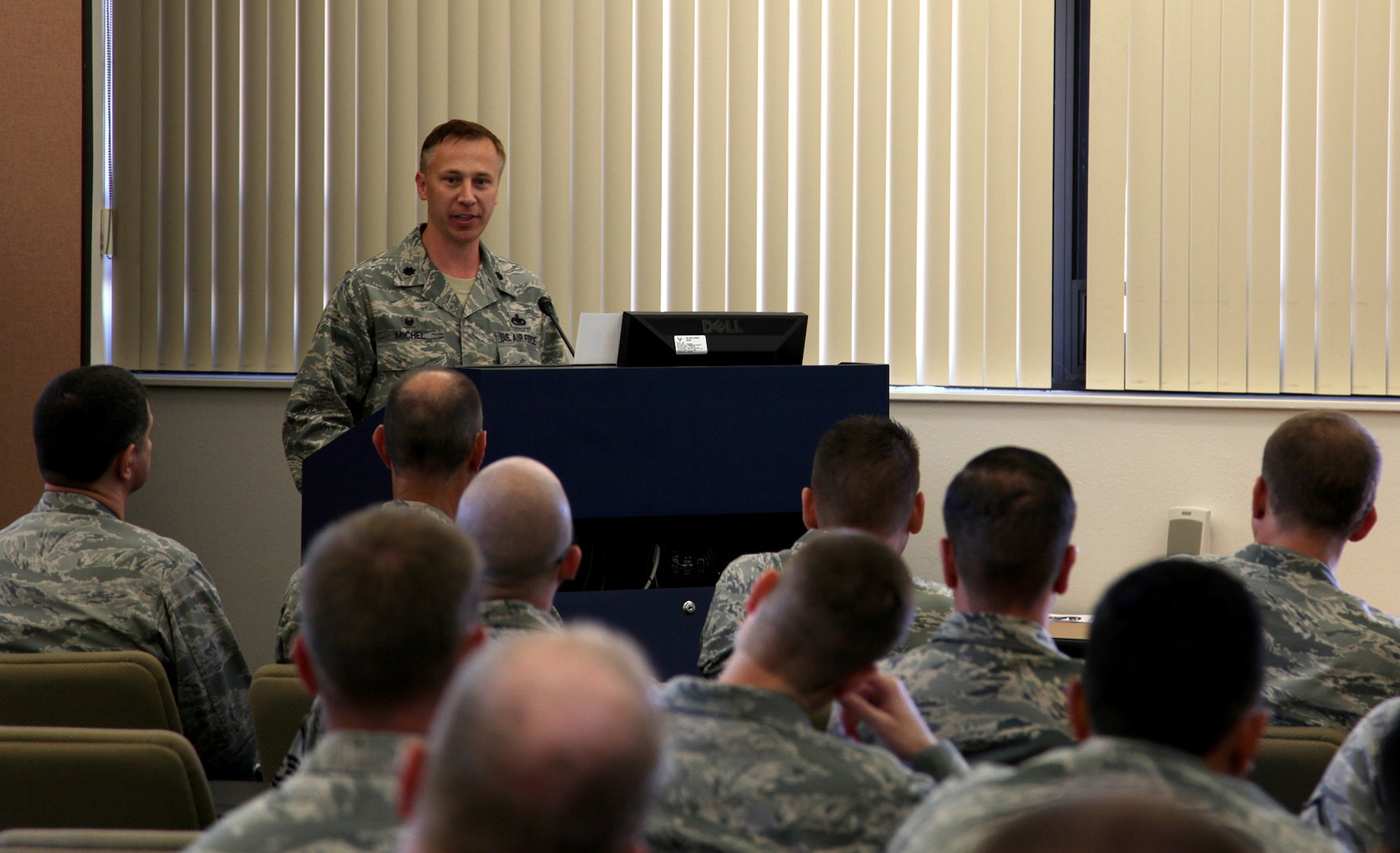 TRAVIS AIR FORCE BASE, Calif. -- Lt. Col. Timothy Michel assumed command of the 55th Aerial Port Squadron in a ceremony officiated by Col. Stuart Toft, 349th Mission Support Group commander, July 26, 2014 at Travis Air Force Base, Calif.  (U.S. Air Force photo/Lt.Col. Robert Couse-Baker)
