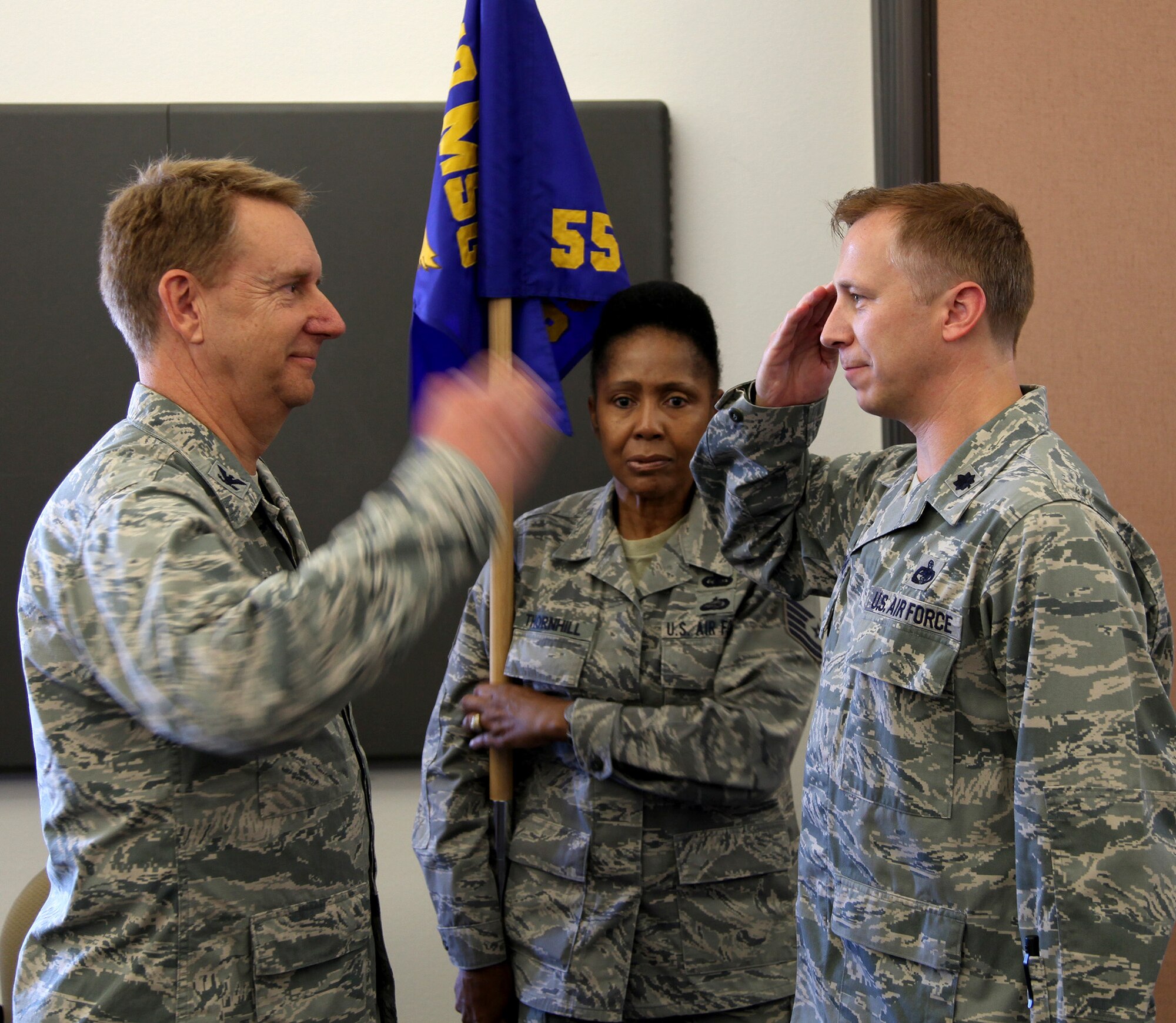 TRAVIS AIR FORCE BASE, Calif. -- Lt. Col. Timothy Michel assumed command of the 55th Aerial Port Squadron in a ceremony officiated by Col. Stuart Toft, 349th Mission Support Group commander, July 26, 2014 at Travis Air Force Base, Calif.  (U.S. Air Force photo/Lt.Col. Robert Couse-Baker)