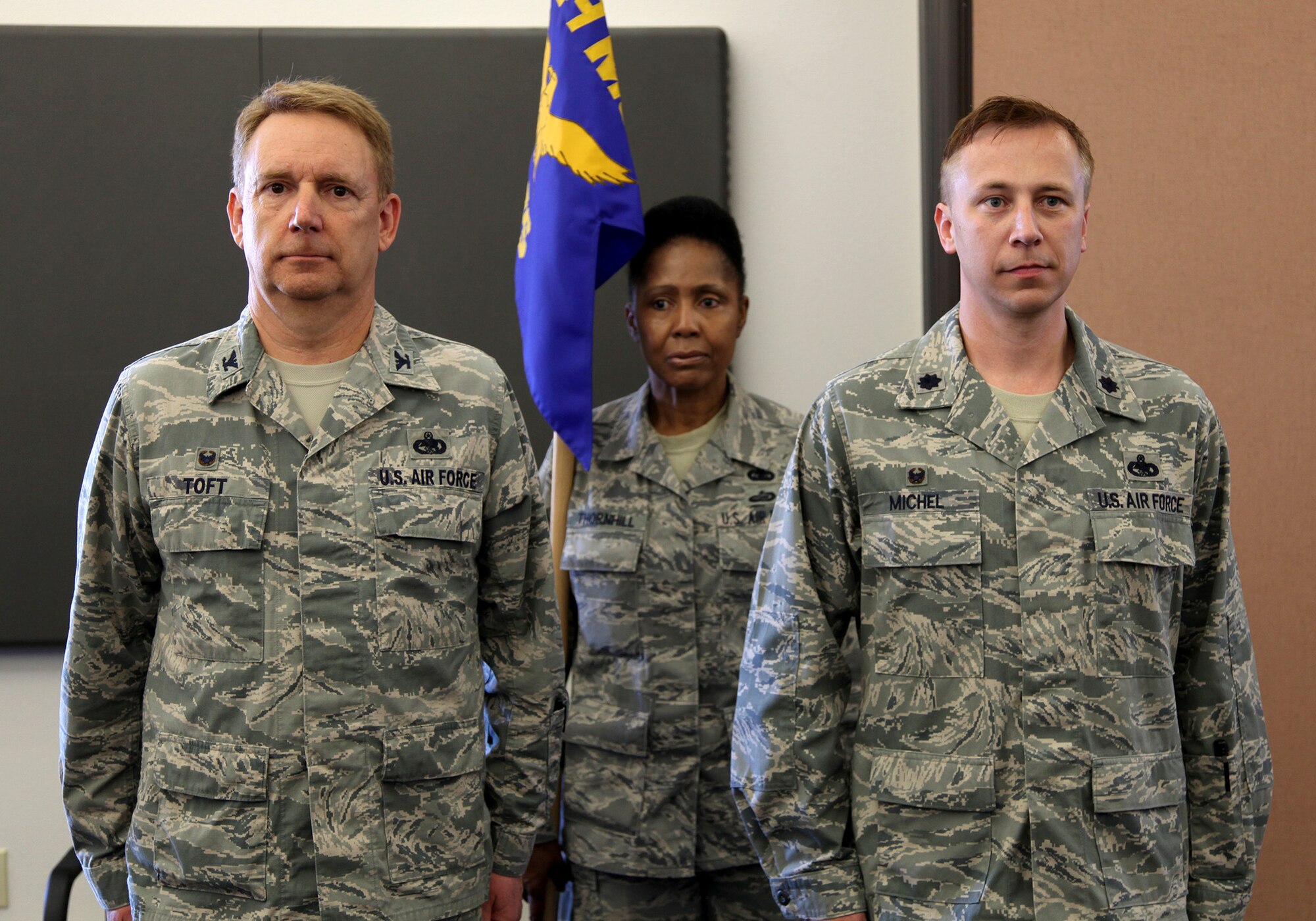 TRAVIS AIR FORCE BASE, Calif. -- Lt. Col. Timothy Michel assumed command of the 55th Aerial Port Squadron in a ceremony officiated by Col. Stuart Toft, 349th Mission Support Group commander, July 26, 2014 at Travis Air Force Base, Calif.  (U.S. Air Force photo/Lt.Col. Robert Couse-Baker)