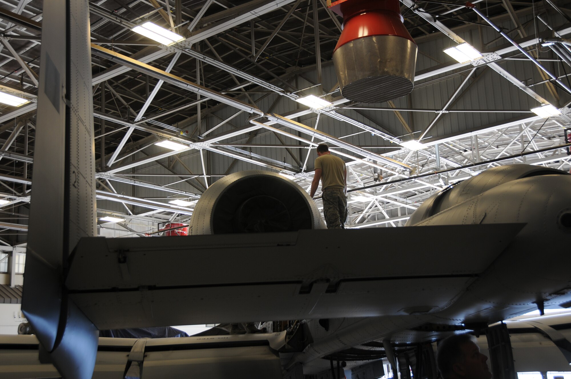Members of the former 188th Aircraft Maintenance Squadron accomplish phase cards on an A-10C Thunderbolt II "Warthog” (Tail No. 621). This aircraft was the second to last phase accomplished at Ebbing Air National Guard Base, Fort Smith, Arkansas. Recently the wing held a conversion ceremony changing from a manned flying mission to a remotely piloted aircraft, intelligence, and reconnaissance mission. The unit currently doesn't have any aircraft assigned. (U.S. Air National Guard photo by Senior Airman John Hillier/released)