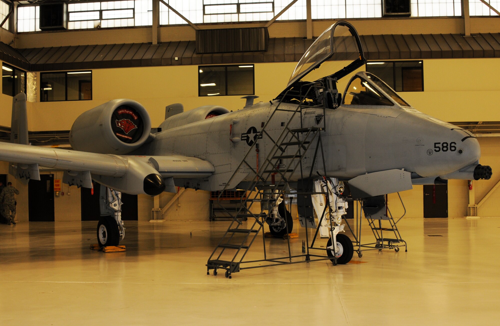 An A-10C Thunderbolt II "Warthog" (aircraft Tail No. 586) is parked inside the main hangar at Ebbing Air National Guard Base, Fort Smith, Arkansas. It was the last aircraft to receive a phase inspection at the 188th. After 60 years of a manned flying mission, the 188th Wing is currently converting to a remote piloted aircraft and intelligence, surveillance and reconnaissance mission. (U.S. Air National Guard photo by Tech. Sgt. Josh Lewis/released)