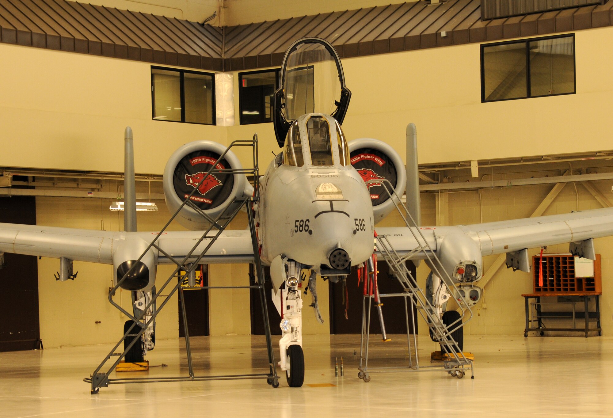 An A-10C Thunderbolt II "Warthog" (aircraft Tail No. 586) is parked inside the main hangar at Ebbing Air National Guard Base, Fort Smith, Arkansas. It was the last aircraft to receive a phase inspection at the 188th. After 60 years of a manned flying mission, the 188th Wing is currently converting to a remote piloted aircraft and intelligence, surveillance and reconnaissance mission. (U.S. Air National Guard photo by Tech. Sgt. Josh Lewis/released)