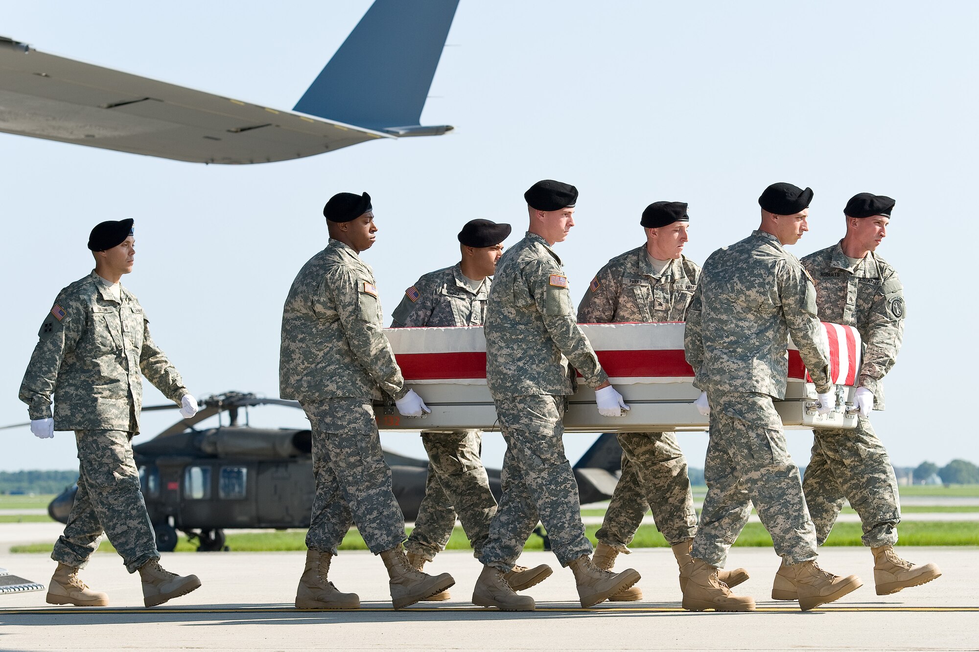 A U.S. Army carry team transfers the remains of Army Maj. Gen. Harold J. Greene of Schenectady, N.Y., Aug. 7, 2014 at Dover Air Force Base, Del. Greene was assigned to the Combined Security Transition Command, Afghanistan. (U.S. Air Force photo/Roland Balik)