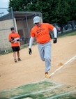 Stephan Price Jr., 23d Operations Support Squadron, runs to home plate during a softball game at Moody Air Force Base, Ga., Aug. 6, 2014. Price is one of two coaches for the 23d OSS intramural softball team. (U.S. Air Force photo by Senior Airman Jarrod Grammel/Released)
