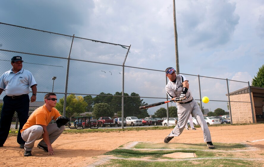 Moses Perez bats for the 723d Aircraft Maintenance Squadron during a softball game at Moody Air Force Base, Ga., Aug. 6, 2014. This was the 723d AMXS’s first game of the playoffs, in which 10 teams will compete for the title. (U.S. Air Force photo by Senior Airman Jarrod Grammel/Released)
