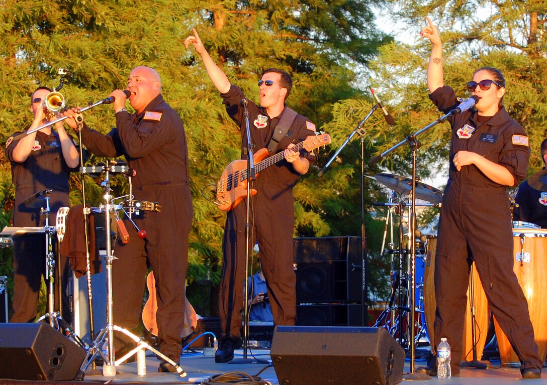 Members of the USAF Heritage of America Band's popular music group Full Spectrum perform for Independence Day Festivities held in Newport News, VA, on July 5, 2014.