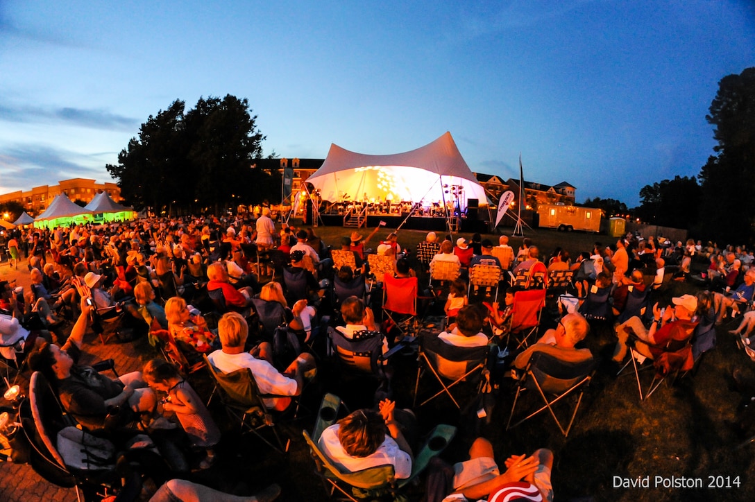 Audience members enjoy the USAF Heritage of America Band present a Memorial Day Concert in Newport News' City Center, May 26, 2014.  Photo courtesy Mr. David Polston