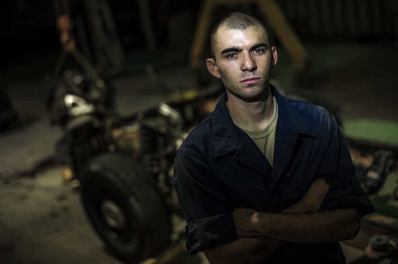 Senior Airman Christopher Moore has been a mechanic for the Air Force for three years and is deployed to Southwest Asia from the 86th Vehicle Readiness Squadron, Ramstein Air Base, Germany, in support of Operation Enduring Freedom. U.S. Air Force photo by Staff Sgt. Jeremy Bowcock