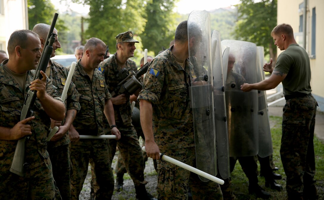 Soldiers from the Armed Forces of Bosnia and Herzegovina learn effective riot control techniques during a non lethal systems familiarization exercise in Sarajevo, Bosnia and Herzegovina. The participants used riot shields, batons, Mossberg 500 shotguns amd M32 grenade launchers during the exercise.