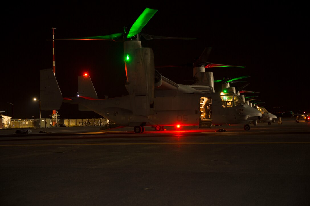 MV-22B Osprey aircraft from Special-Purpose Marine Air-Ground Task Force
Crisis Response prepare to leave Naval Air Station Sigonella, Italy, to escort
approximately 150 personnel from the U.S. Embassy in Tripoli, Libya, on the
morning of July 26, 2014. The Department of State, in coordination with the
U.S. Ambassador for Libya, requested Department of Defense support for a
military-assisted departure of embassy personnel. SP-MAGTF Crisis Response is
a self-deploying, self-sustaining task force with the capacity to provide a
rapid-response capability to U.S. Africa Command. (Official Marine Corps photograph by Cpl. Shawn Valosin)