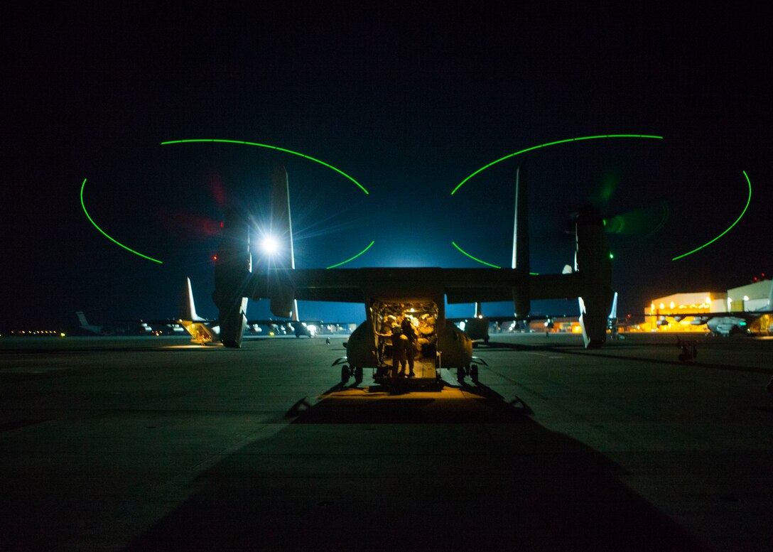 Crew members conduct final inspections on an MV-22B Osprey with Special-Purpose Marine Air-Ground Task Force Crisis Response prior to departure, July 26, 2014. The Department of State, in coordination with the U.S. Ambassador for Libya, requested Department of Defense support for a military-assisted departure of embassy personnel. SP-MAGTF Crisis Response is a self-deploying, self-sustaining task force with the capacity to provide a rapid-response capability to U.S. Africa Command. (U.S. Marine Corps photo by 1st Lt. Maida Kalic)