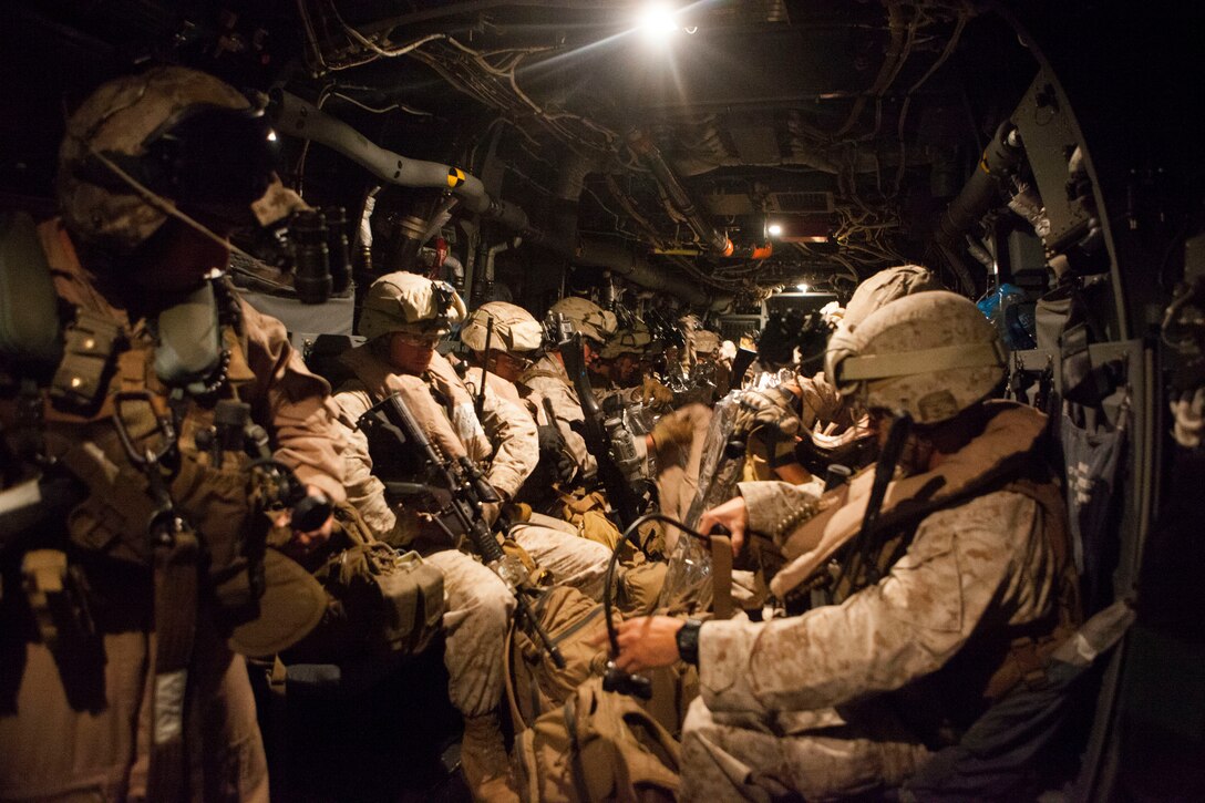 A quick reaction force with Special-Purpose Marine Air-Ground Task Force Crisis Response prepares to depart Naval Air Station Sigonella, Italy, in support of a military assisted departure from the U.S. Embassy in Tripoli, Libya, Saturday, July 26, 2014. The Department of State, in coordination with the U.S. Ambassador for Libya, requested Department of Defense support for a military-assisted departure of embassy personnel. SP-MAGTF Crisis Response is a self-deploying, self-sustaining task force with the capacity to provide a rapid-response capability to U.S. Africa Command. (U.S. Marine Corps photo by 1st Lt. Maida Kalic)