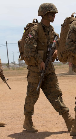 Private Christopher J. Bell, Platoon 1062, Delta Company, 1st Recruit Training Battalion, marches with his platoon after completing the Crucible Confidence Course at Marine Corps Base Camp Pendleton, Calif., July 29.  Bell realizes he has come a long way both personally and professionally since the beginning of recruit training.