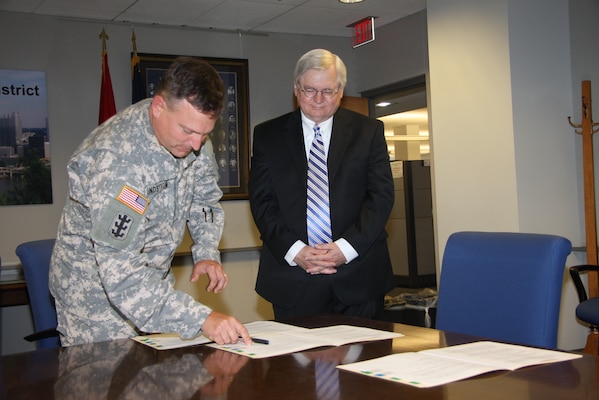 The simple act of putting pen to paper sealed the deal on a new partnership between two public agencies.
While other districts have performed planning assistance for states in their regions, the agreement signed, Aug. 6, by Col. Bernard Lindstrom, Pittsburgh District commander, and James Hassinger, Southwestern Pennsylvania Commission executive director, is a first for the district.
