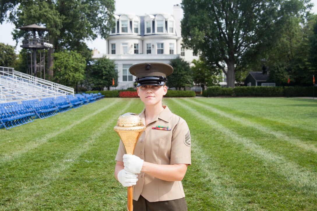 Washington, D.C.-
The Drum Major is a respected and coveted position within the United States Marine Drum & Bugle Corps. Master Gunnery Sgt. Kevin Buckles is the current Drum Major and Senior Enlisted Advisor of the unit. Each year one SNCO is chosen through an arduous audition to fill the role of the Drum Major and represent the D&B during the SNCO Friday Evening Parade, which will be held on 15 August at Marine Barracks Washington, D.C. 

The representative for the 2014 SNCO Evening Parade is Staff Sgt. Codie Williams. In reference to being chosen as the SNCO Drum Major, Staff Sgt. Williams stated "I look forward to marching down the parade deck and leading the Marines in front of the public. It is a great chance to showcase how special ‘The Oldest Post’ is." Every key billet in the 15 August parade will be filled by SNCOs from Marine Barracks Washington, D.C. Positions traditionally held by senior Staff NCO's and Officers. (Photo By: Staff Sgt. Joshua D. Miles/Released)


