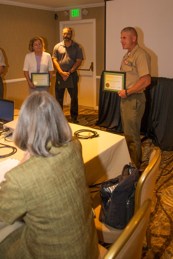 Lt. Col. Jon Davenport, director of Installations and Logistics at Marine Corps Air Station Miramar, Calif., speaks during the Federal Regional Council Meeting in San Diego, Aug. 7. Davenport attributed the air station’s success to the hard work and dedication of the personnel whose sole purpose is to lower its waste and energy footprint in the San Diego community.
