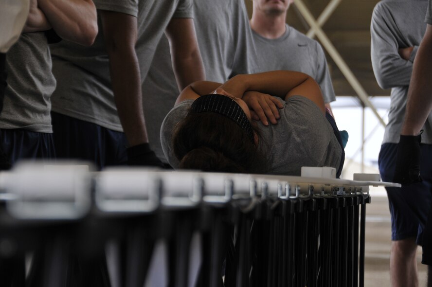 Airmen from the 188th Wing practice decontaminating a victim of a contamination scenario during decontamination training at Ebbing Air National Guard Base, Arkansas, July 17. The volunteers, who were from various parts of the wing, learned how to set up a decontamination tent and clean victims of various chemical or nuclear hazards. This training will aid the wing in its mission to support Arkansas citizens in times of disaster. (U.S. Air National Guard photo by Staff Sgt. John Suleski/released)