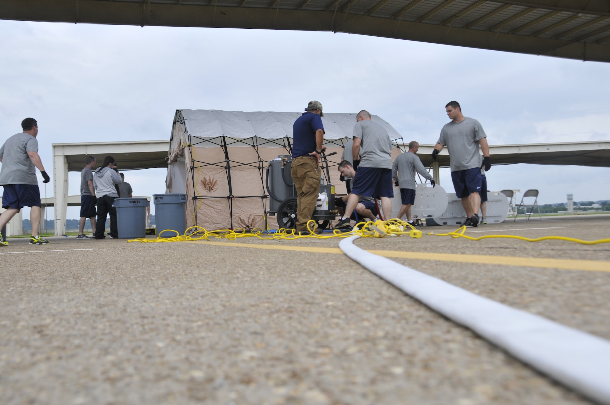 Airmen from the 188th Wing attend decontamination training at Ebbing Air National Guard Base, Arkansas, July 17. The volunteers, who were from various parts of the wing, learned how to set up a decontamination tent and clean victims of various chemical or nuclear hazards. This training will aid the wing in its mission to support Arkansas citizens in times of disaster. (U.S. Air National Guard photo by Staff Sgt. John Suleski/released)