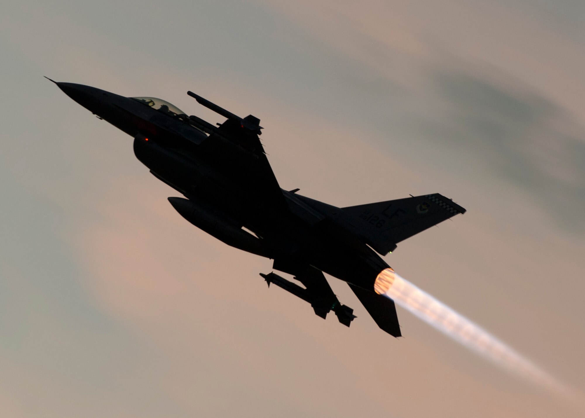 An F-16 Fighting Falcon takes off for a training sortie over the White Sands Missile Range's 10,000 square mile range at Holloman Air force Base, N.M., Aug. 5. The 54th FG is a detachment of Luke AFB, Ariz., and is stationed on Holloman to facilitate high-speed training, live fire weapons training, and night flying operations. (U.S. Air Force photo by Airman 1st Class Leah Ferrante/Released)