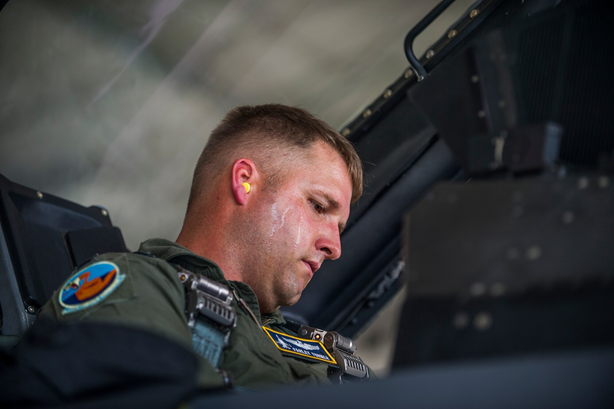 Capt. Howard Turner, 54th Fighter Group pilot, performs pre-flight checks prior to a training sortie over the White Sands Missile Range's 10,000 square mile range at Holloman Air Force Base, N.M., Aug. 5. The 54th FG is a detachment of Luke AFB, Ariz., and is stationed on Holloman to facilitate high-speed training, live fire weapons training, and night flying operations. (U.S. Air Force photo by Airman 1st Class Aaron Montoya / Released)